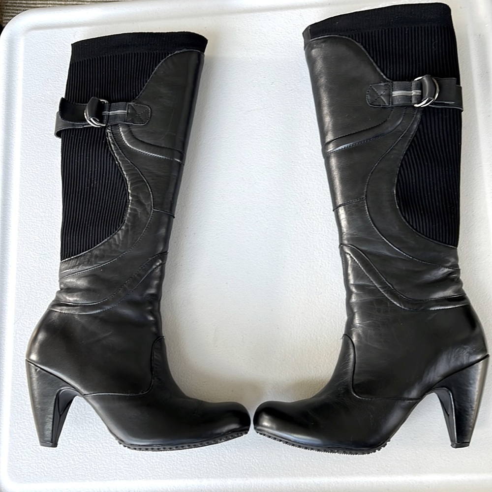 Blondo Tasha  Black leather and sweater type fabric. Super Cute and adj. A+ cond
